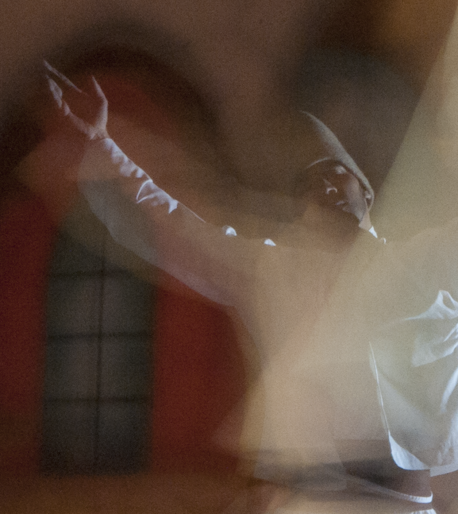 Close-up of one of the whirling dervishes during the dance in the Sufi Sema ceremony in Istanbul. (Image © Meredith Mullins)