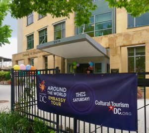 A banner for the Around the World Embassy Tour, part of Passport DC, celebrates the wisdom of crossing cultures. (Image © Joyce McGreevy)