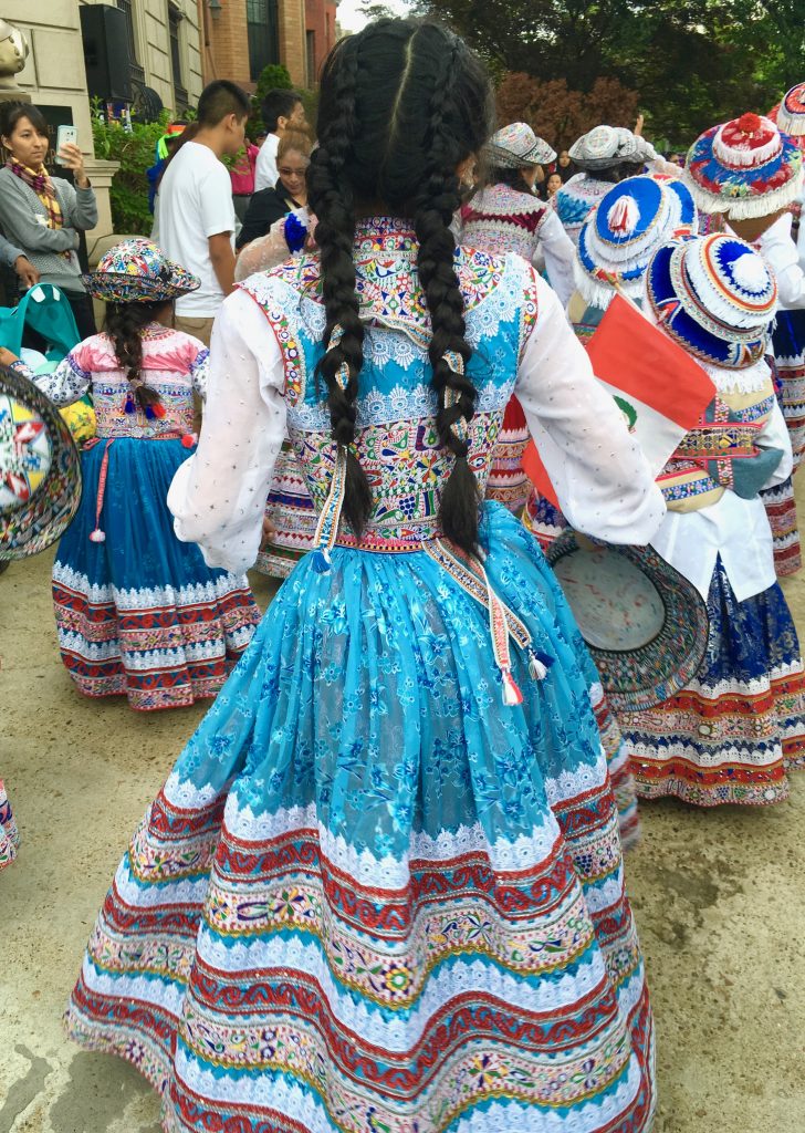 Traditional dancers outside the Embassy of Peru in Washington, DC show why crossing cultures draws so many visitors to Passport DC. (Image © Joyce McGreevy)