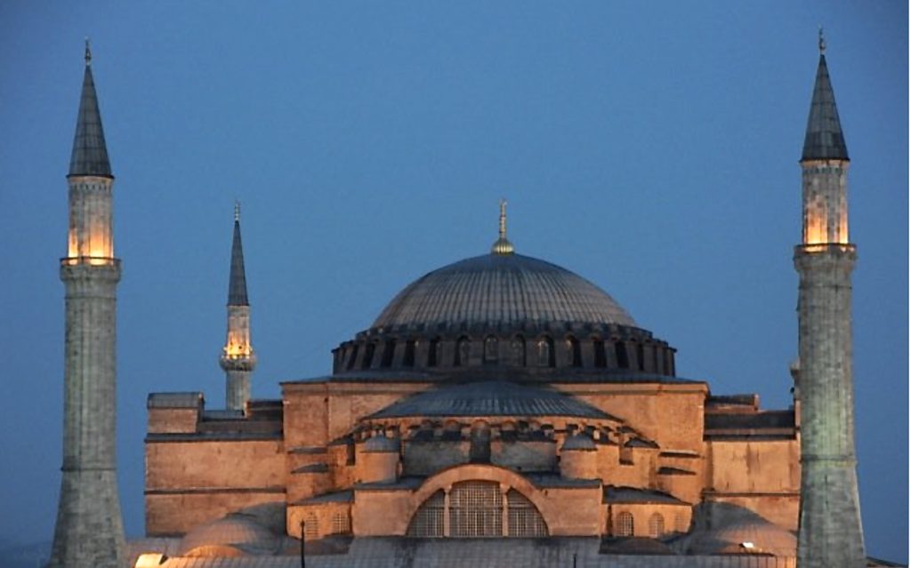 Mosque at dusk in Istanbul, city where the whirling dervishes dance in the Sufi Sema ceremony. (Image © Meredith Mullins)