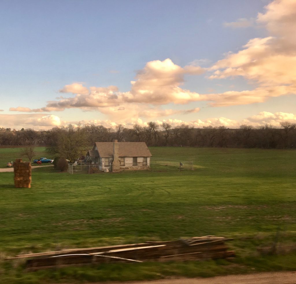 An old structure in San Miguel, California, seen from a train during a Trails & Rails tour, inspires aha moments. (Image© Joyce McGreevy) 