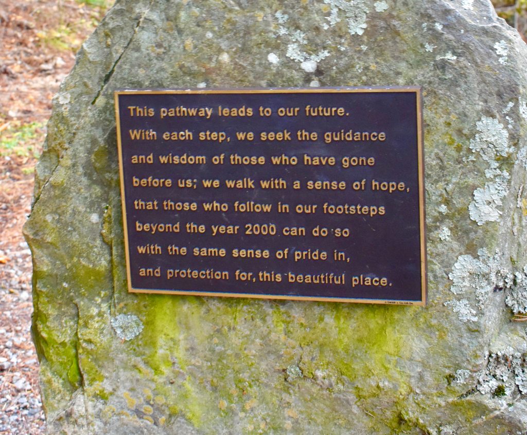 A stone plaque at Queenstown Hill inspires a hiker in New Zealand to consider the wordplay of pathways. (Image Â© Joyce McGreevy)