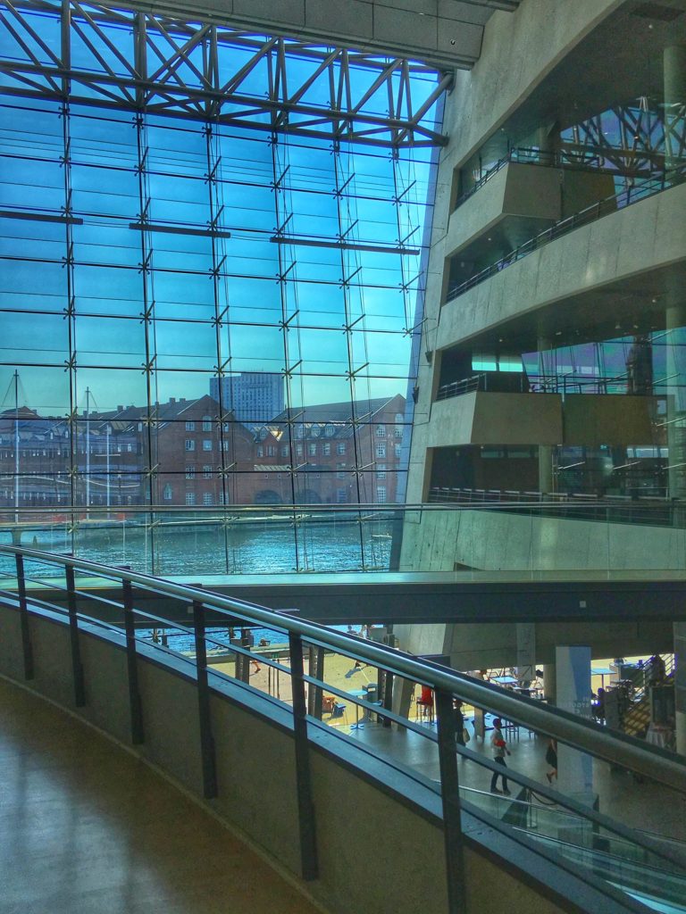 The interior of the Black Diamond, part of Copenhagen’s Royal Danish Library, shows why wanderlust leads travelers to public libraries, or library tourism, around the world. (Image © Joyce McGreevy)