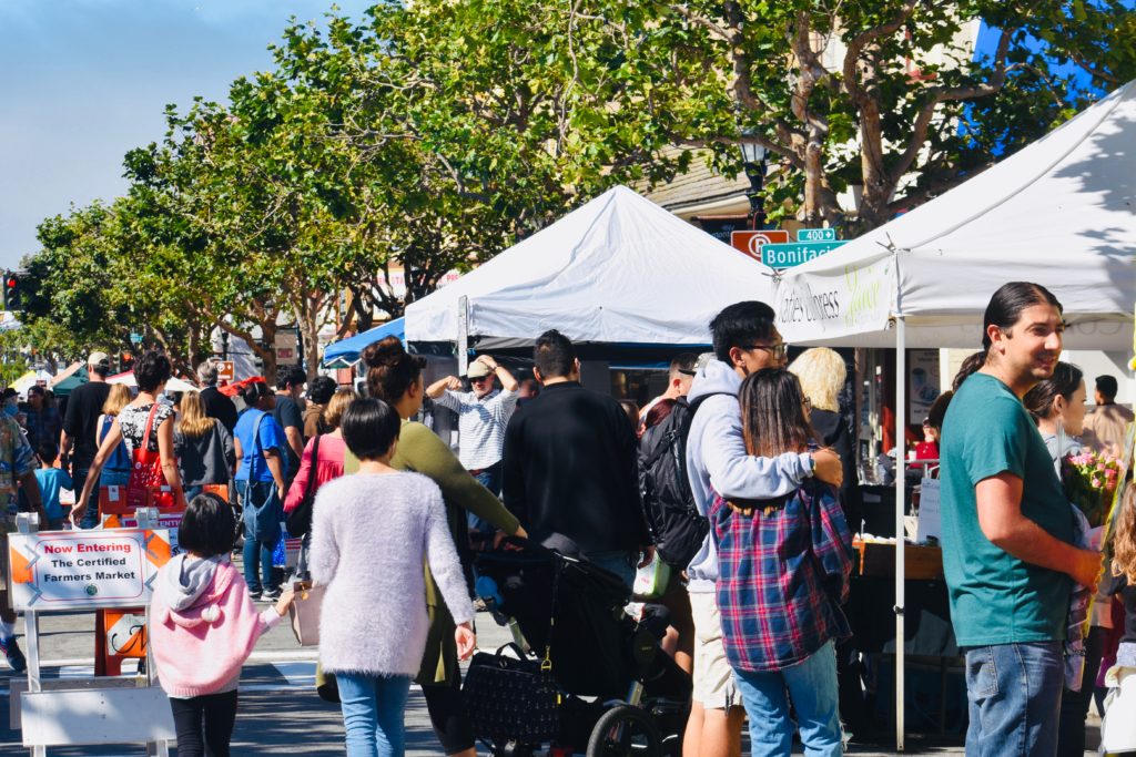 People at Monterey Marketplace on Alvarado Street reflect the popularity of farmers markets as an American custom. (Image © Joyce McGreevy)