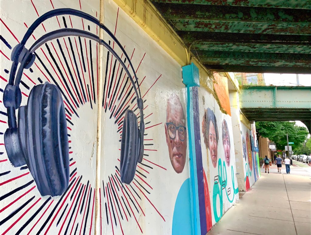 Headphones depicted in public street art in Evanston, Illinois evoked the idea of traveling the world musically. (Image © Joyce McGreevy)