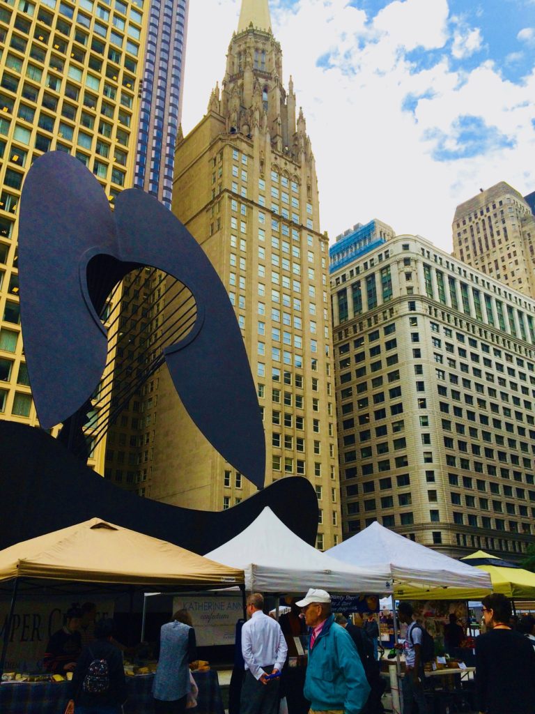Artwork by Picasso and skyscrapers in Daley Plaza, Chicago suggest the variety of American farmers markets. (Image © Joyce McGreevy)