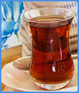 A glass of Turkish tea at a cultural festival in Monterey, California inspires memories of Istanbul, Turkey. (Image © Joyce McGreevy)