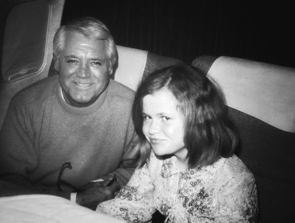 A 1970 photo of Cary Grant, shown with the writer Joyce McGreevy at age 15 on a Trans World Airlines flight, evokes TWA’s golden age as a nexus of travel inspiration and glamour. (Image © McGreevy archives)