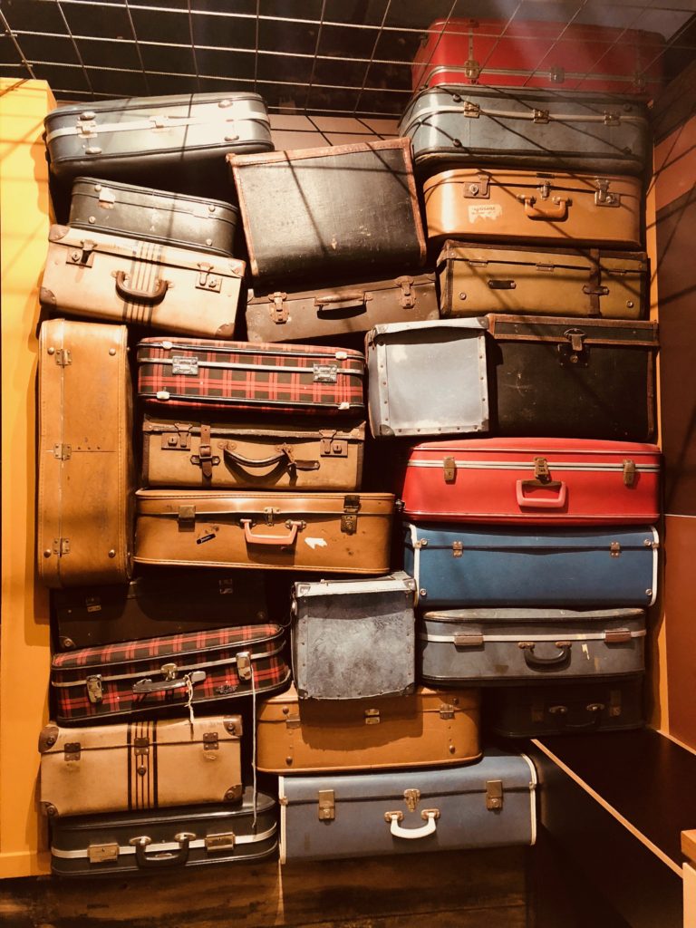 Stacks of baggage in New Zealand remind a writer that travel tips and travel advice don’t outrank personal travel discoveries. (Image © Joyce McGreevy)