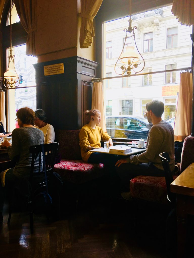 People at a café in Vienna remind a writer that travel tips and travel advice don’t outrank personal travel discoveries. (Image © Joyce McGreevy)