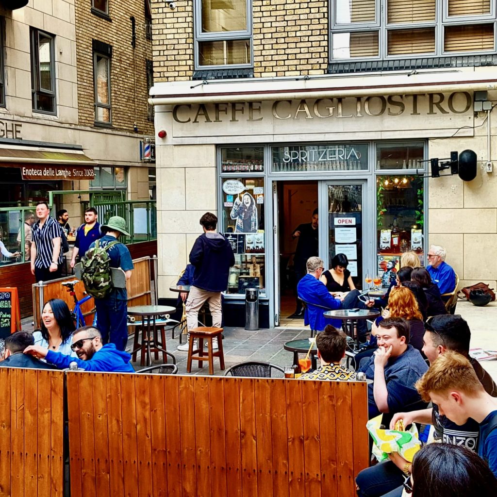 People gather at Caffe Cagliostro in the Italian Quarter, Dublin, Ireland, one of many Little Italy enclaves around the world that celebrate Italian culture. Image © Andrea Romano 