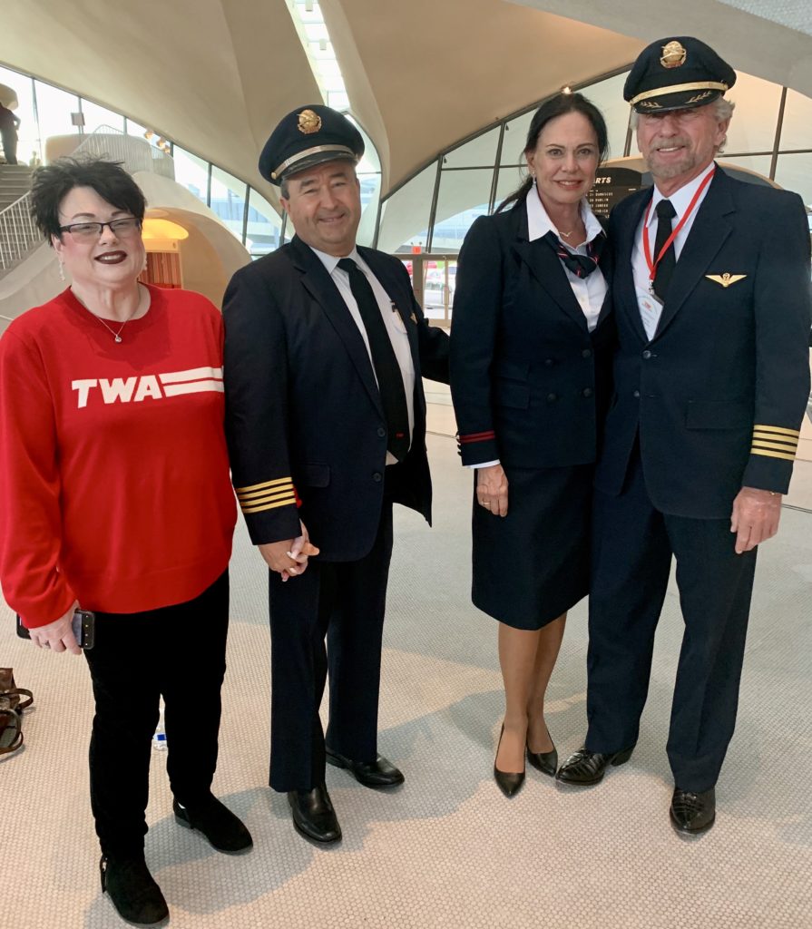 Myra Briggs, former Trans World Airlines pilot Tracy Briggs, meet other TWA alumni at the TWA Reunion held at the TWA Hotel, JFK Airport New York, and share airline travel memories. (Image © Joyce McGreevy)
