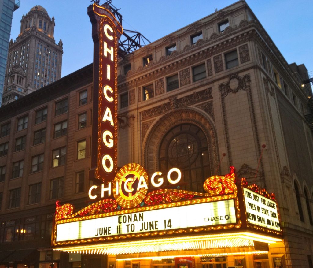 The Chicago Theater sign features a surprising little detail, prompting the travel tip “slow down and focus” in America’s Best Big City. (Image © by Joyce McGreevy)