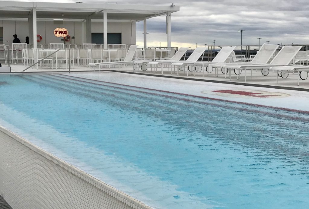 A swimming pool becomes part of the travel memories of the TWA Hotel, JFK Airport, New York. (Image © Erin McGreevy Bevando)