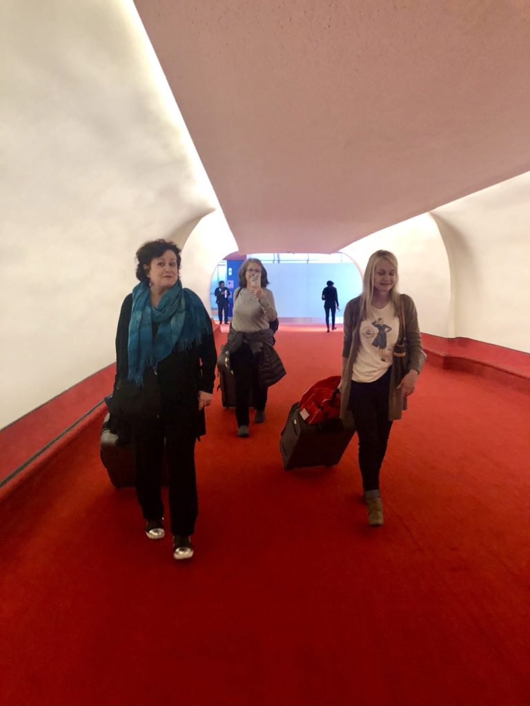 Three sisters arriving at the TWA Hotel at JFK Airport New York for the TWA Reunion share travel memories of growing up with Trans World Airlines. (Image © Margie McGreevy)