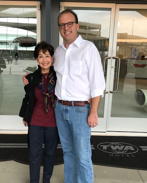 Former Trans World Airline flight attendant Yvonne Greenwood meets TWA Hotel developer Tyler Morse at JFK Airport New York during the TWA Alumni Reunion. (Image © Jim Greenwood)