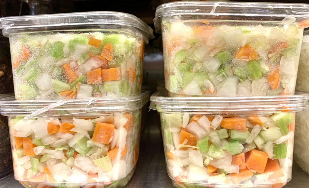 Containers of French mire-poix is one example of a “culinary trinity” with onions, a global food base crossing cultures in a variety of ways. (Image © Joyce McGreevy)