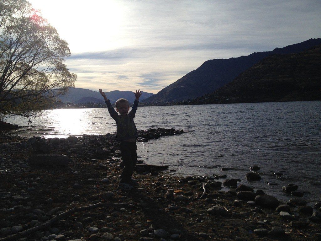 Maria Surma Manka’s son August discovers the joy of being a digital nomad at Lake Wakatipu, New Zealand, during a family workation. (Image © Maria Surma Manka)