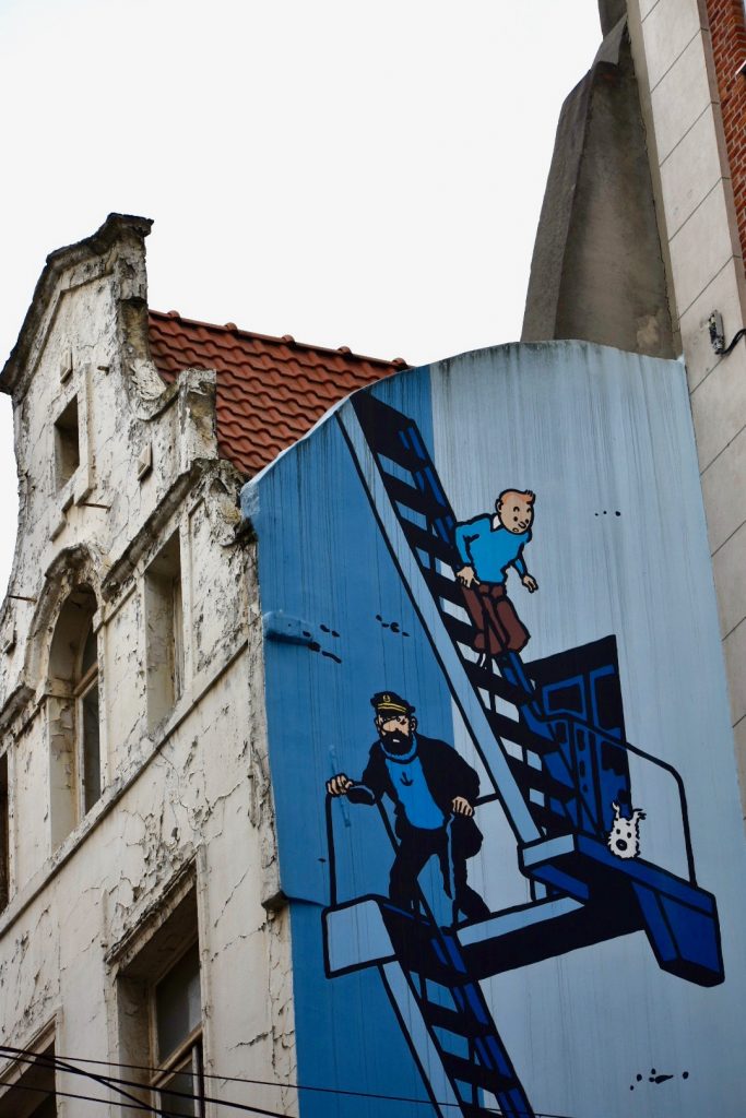 The Tintin mural in Brussels, Belgium showcases comic book art as a cultural tradition. (Image © Joyce McGreevy)