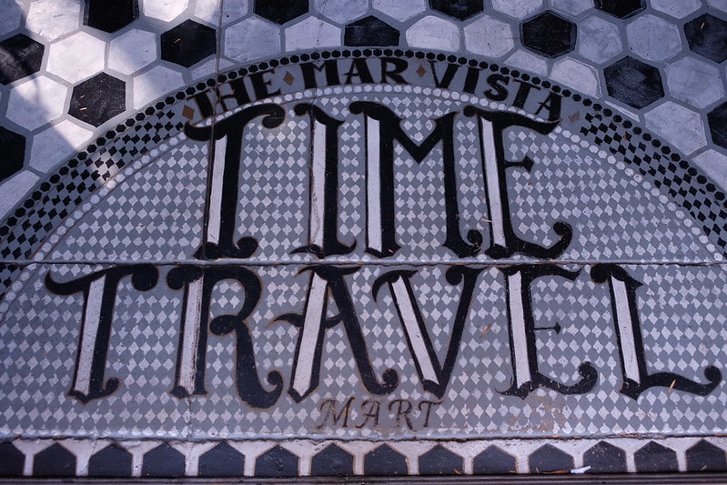 A signboard reading “The Mar Vista Time Travel Mart” hints that time travel ninjas have the ultimate hack for turning 20/20 hindsight into a perfect past experience. (Photo © and courtesy of 826LA)