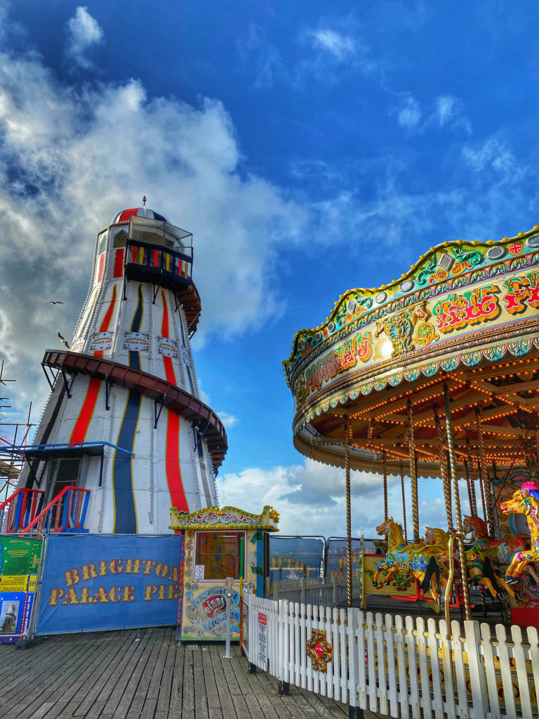 A replica of the 1902 halter skelter on a winter’s day evokes wanderlust for summer excursions to the Brighton Palace Pier on England’s South Coast. (Image © Joyce McGreevy)