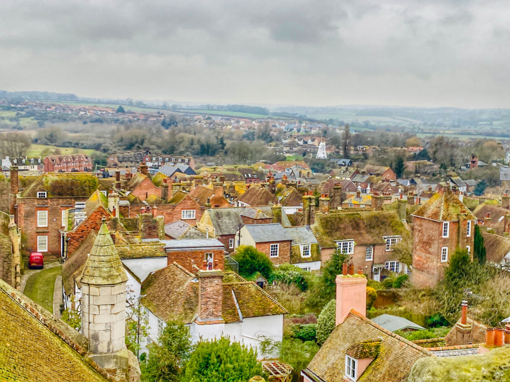 A view of the rooftops of Rye, a picturesque English town in East Sussex, England, is ample reward for a traveler with wanderlust for a winter vacation in England. (Image © Joyce McGreevy)