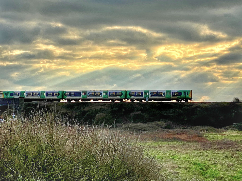 A train in East Sussex, one of many, makes it easy to follow your winter wanderlust and travel between the historic towns of England’s South Coast. (Image © Joyce McGreevy)