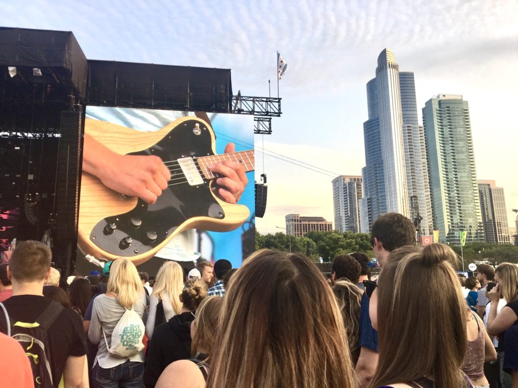 A concert at Lollapalooza taken before the pandemic reminds that author that travel memories inspired by music can be comforting now that such popular events have been canceled. (Image © by Julie Larkin)
