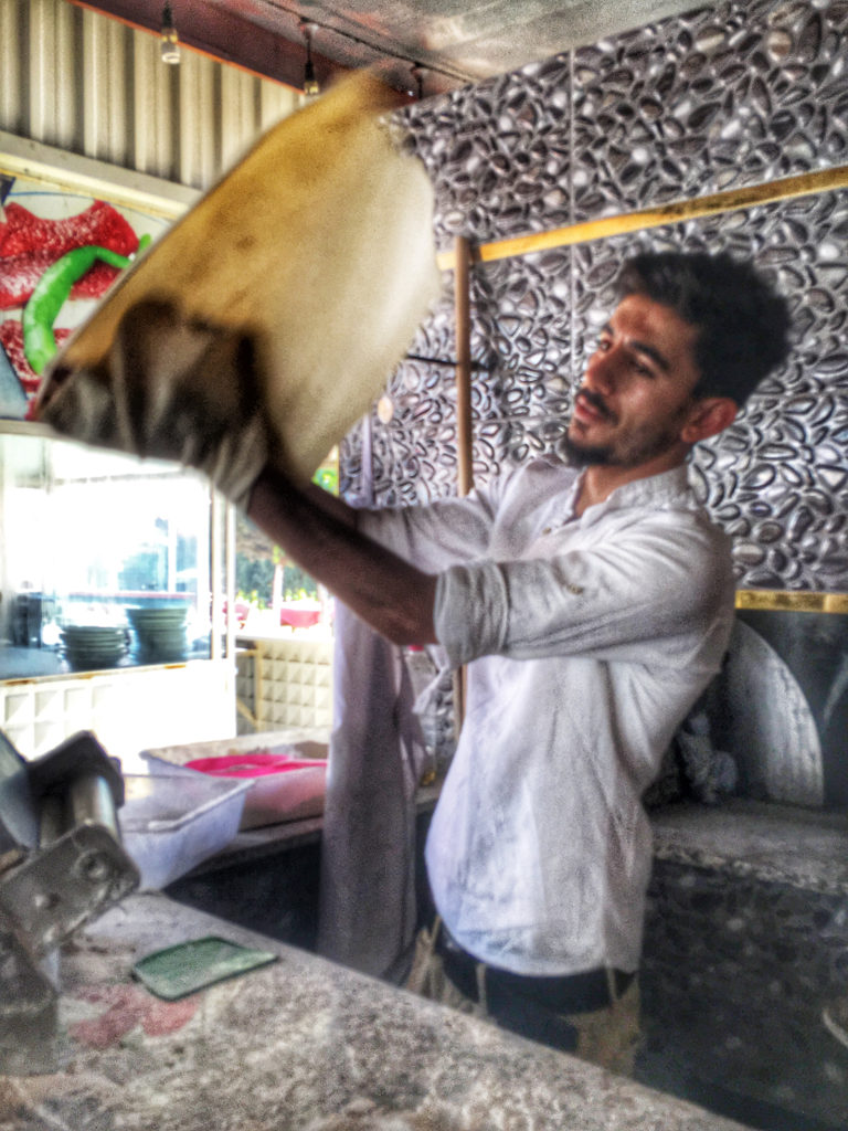 A baker making lavash bread in Turkey reminds a digital nomad aof lessons learned from travel. (Image © by Joyce McGreevy)