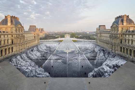 Artivist JR's installation at the Louvre in Paris in 2019, showing social awareness and answering the question can art change the world. (Image © JR.)