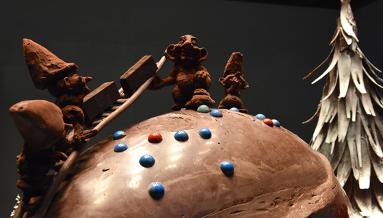 A chocolate elf workshop, showing cultural traditions of National Chocolate-Covered Anything Day. (Image © Meredith Mullins.)