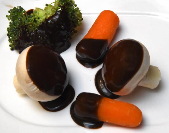 Chocolate-covered vegetables, showing cultural traditions for National Chocolate-Covered Anything Day. (Image © Meredith Mullins.)