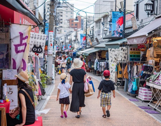 Shoppers stroll a scenic street in Tokyo, the setting for Yuma Wada’s online Japanese food tour and trivia night. (Image © by Yuma Wada/ Ninja Food Tours)