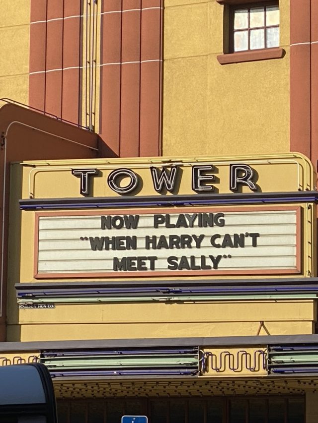 A movie theater marquee comments during the pandemic, the epic wait when visions of normal life, travel memories, and other dreams kept hope alive. (Image © Joyce McGreevy)