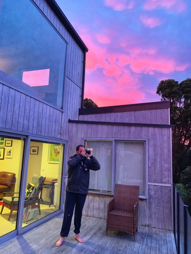  A glowing sky in Stewart Island, New Zealand inspires travel memories and dreams of a return journey during the epic wait from “quarantine to vaccine”. (Image © Joyce McGreevy)
