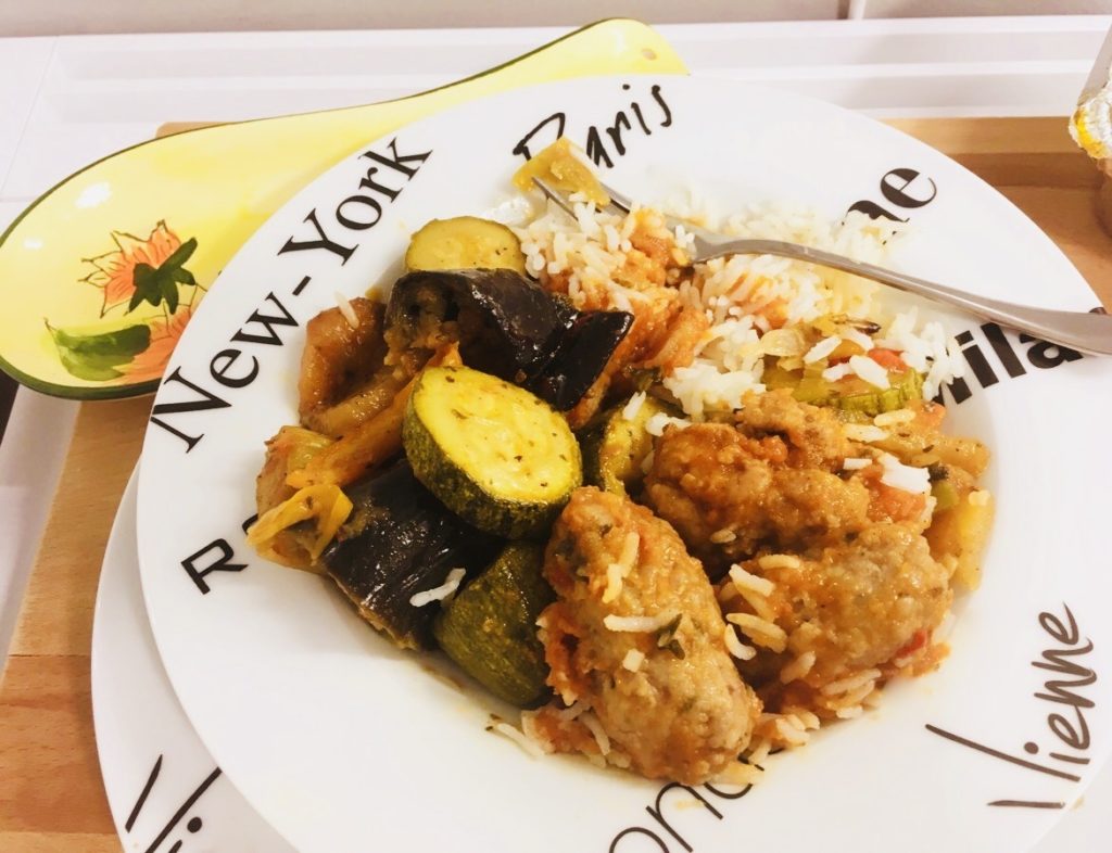 A rice dish in Athens, Greece, and a bowl decorated with names of world cities featuresin the culinary travel adventure of a writer on the trail of food origin stories. (Image by Joyce McGreevy)