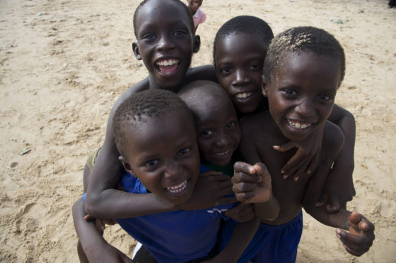 Boys in M'Bour, Senegal, a sister city and twin town of Jackson, Mississippi, enabling cultural encounters around the world. (Image © Meredith Mullins.)