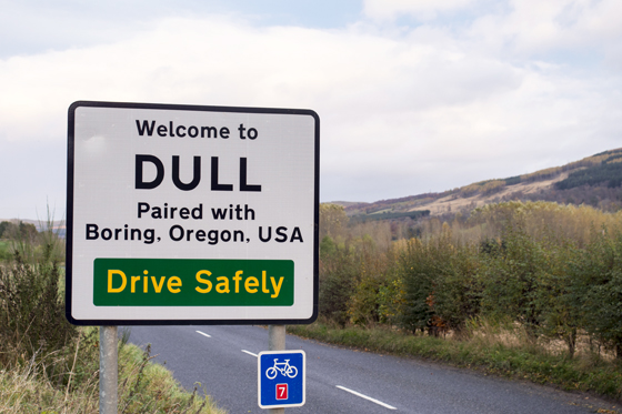 Sign at the village of Dull, Scotland, paired with sister city Boring, Oregon, examples of sister cities and twin towns around the world. (Image © Gannett77/iStock.)