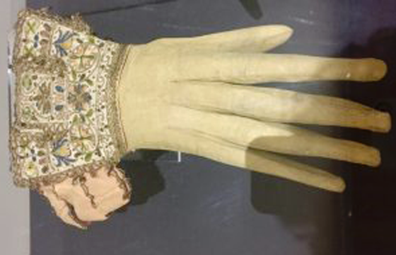 A 17th century glove with an embroidered cuff to illustrate how fashion expressions and idioms are a fun form of wordplay. (Image © Joyce McGreevy)