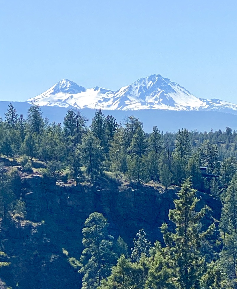 The Cascade Mountains let an air traveler newly returned to Bend, Oregon breathe fresh air, as noted in her diary of flying “on a wing and d dare” during the pandemic. (Image © Joyce McGreevy)