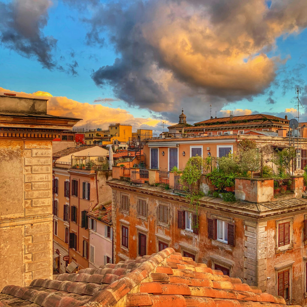 A view of the rooftops of Rome inspires wanderlust for Italy and illustrates why Rome is a recommended destination in the author's travel planning tips for Italy. (Image © by Joyce McGreevy)